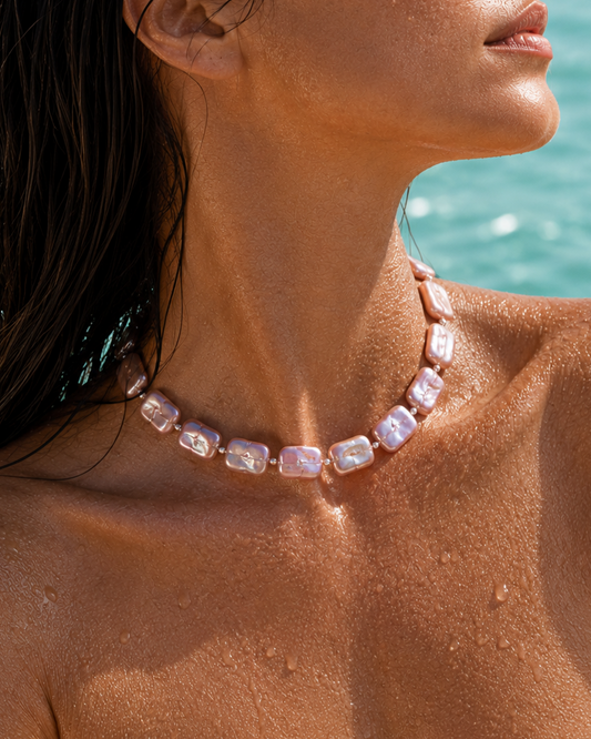 Row of pink mother-of-pearl rectangles